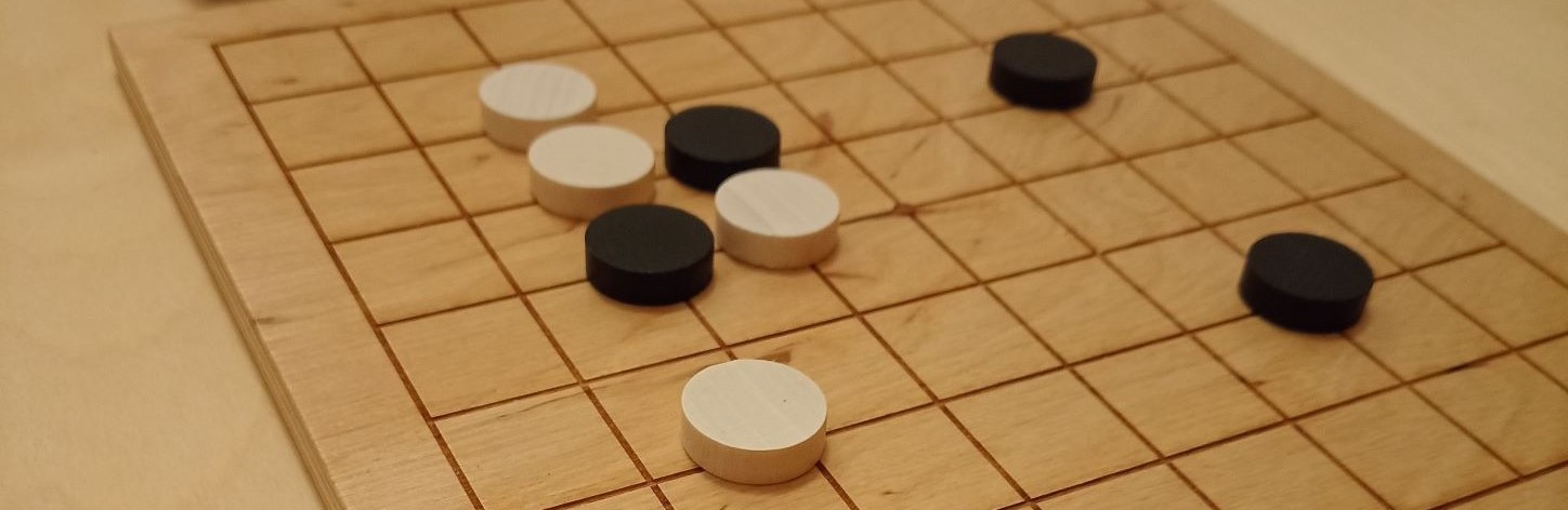 Go board with stones